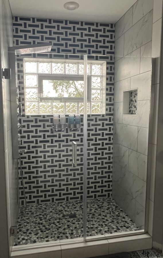 Basket weave shower seen straight on with glass block window
