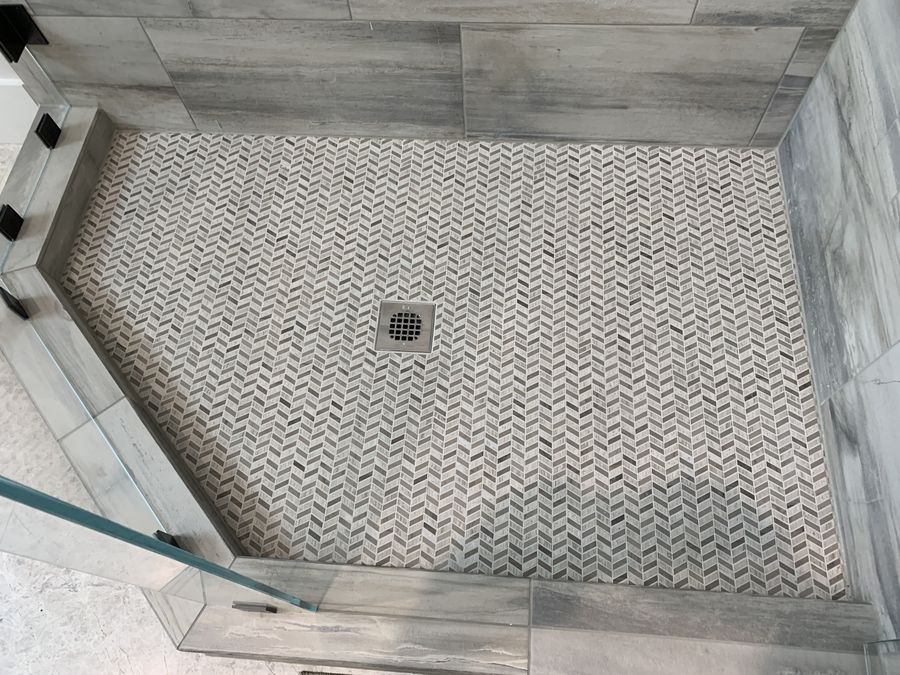 Chevron mosaic shower pan seen from above